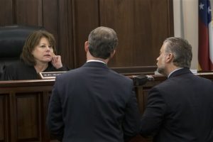 Cobb County Superior Court Judge Mary Staley Clark, left, discusses potential jurors with Defense Attorney H. Maddox Kilgore, right, and Cobb Judicial Circuit Senior Assistant District Attorney Chuck Boring, center, during the first day of jury selection at the Ross Harris trial in Brunswick, Ga., Monday, Sept.12, 2016. Harris is charged with murder in the June 2014 death of his 22-month-old son, Cooper. The child died in the back seat of a hot SUV. (Stephen B. Morton/The Atlanta Journal Constitution via AP, Pool)