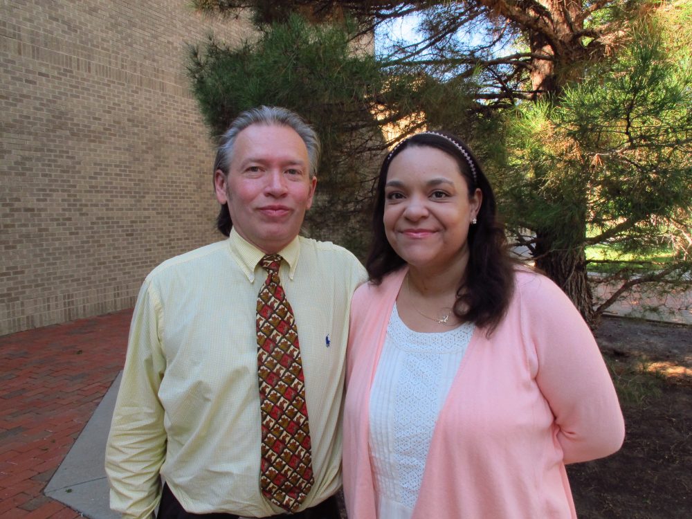 In a photo taken Sept. 9, 2016, William A. and Claire Rembis stand outside the Texas Tech University Law School in Lubbock, Texas. The couple is trying to regain custody of their 11 children after Texas child welfare officials took custody of them following allegations that include some of the children going into garbage bins to get scraps of food to eat. (AP Photo/Betsy Blaney)