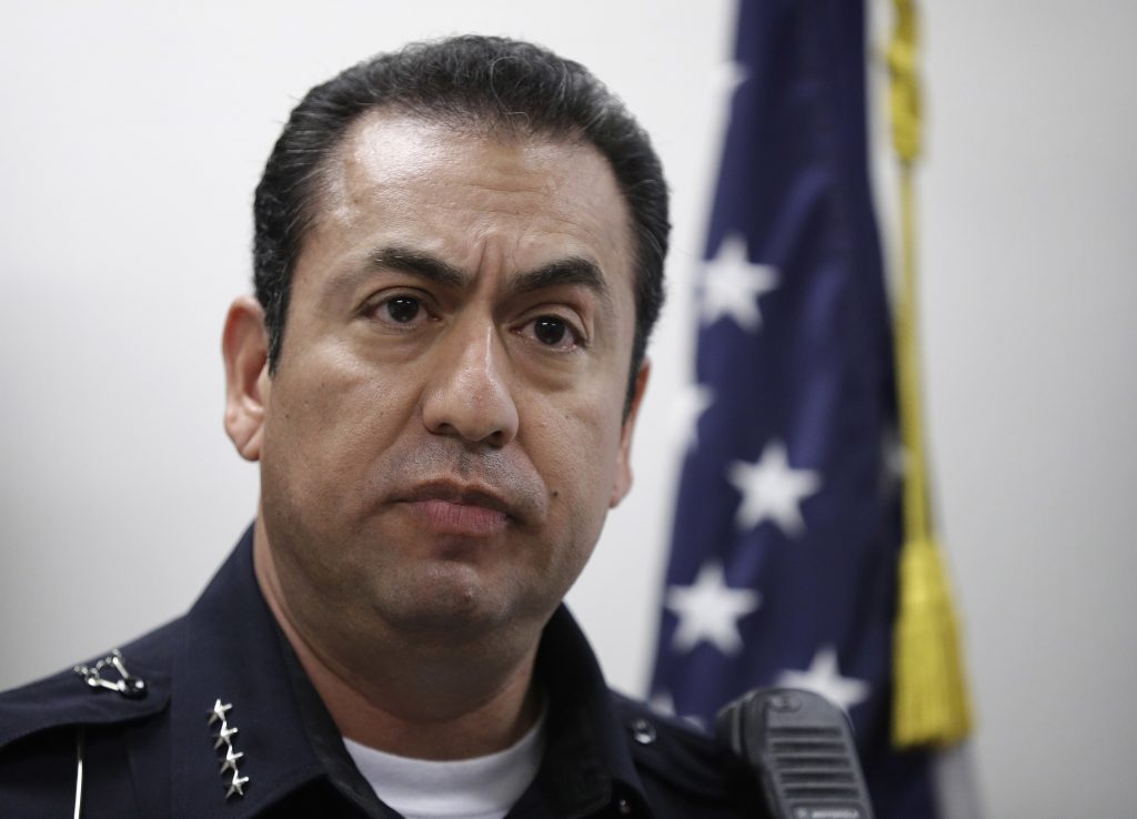North Las Vegas Police Chief Alex Perez speaks during a news conference Wednesday, Sept. 7, 2016, in North Las Vegas, Nev. Alonso Perez, a Nevada homicide suspect who became the focus of a four-day manhunt after breaking his handcuffs and escaping from a police interview room was recaptured in Las Vegas, less than a mile from where authorities found a work truck he's believed to have stolen to get away, police said Wednesday. (AP Photo/John Locher)