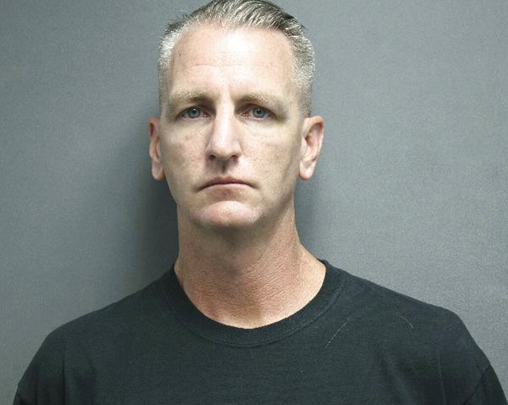 Texas police officer charged with murder in Dallas shooting